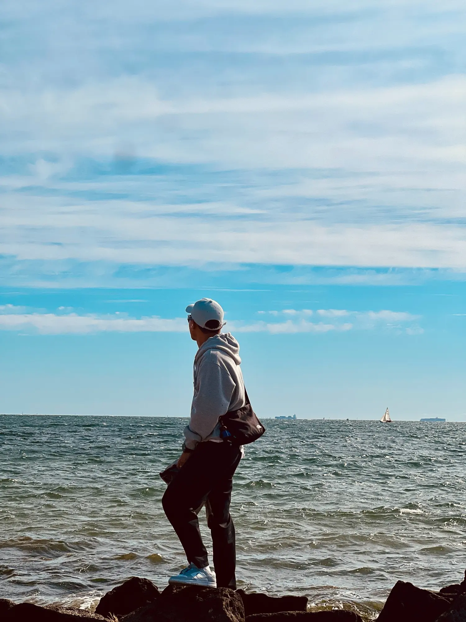 Bobby standing beside the sea