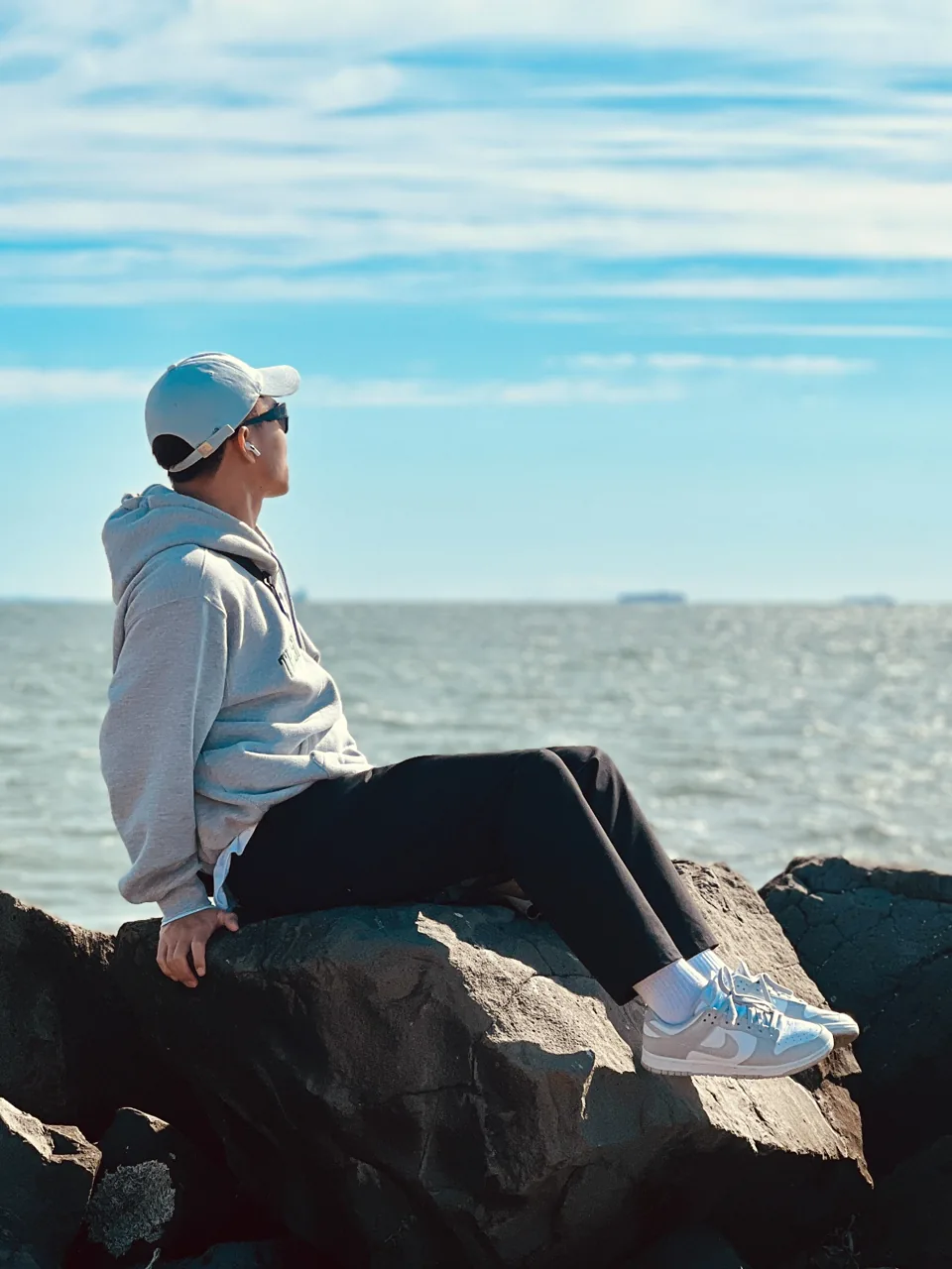 Bobby sitting by the sea